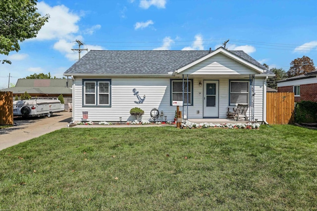 view of front of home with a front lawn and a porch