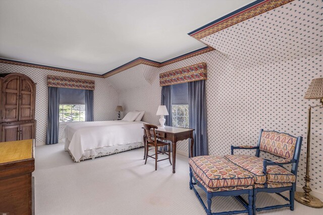 bedroom featuring ornamental molding and carpet floors