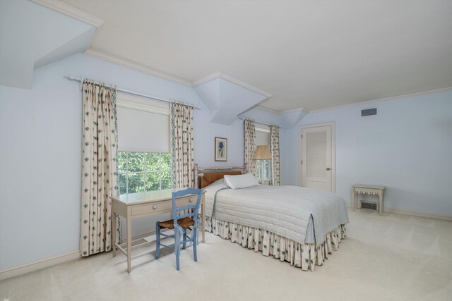 carpeted bedroom featuring crown molding