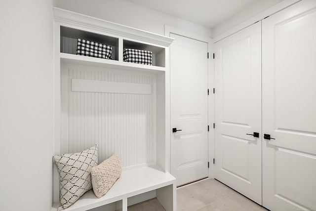 mudroom featuring light tile patterned flooring