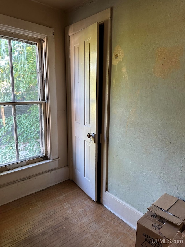 spare room featuring light wood-type flooring