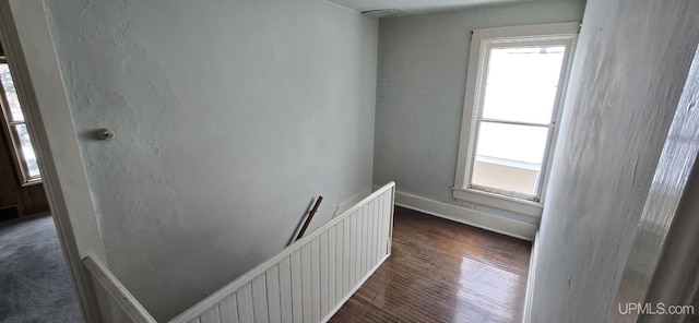 904 W A St, Iron Mountain, MI 49801 - stairway featuring healthy amount of natural light, wood finished floors, and baseboards
