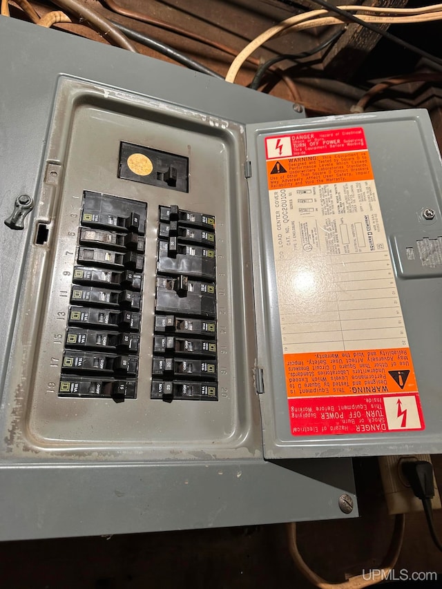 utility room featuring electric panel