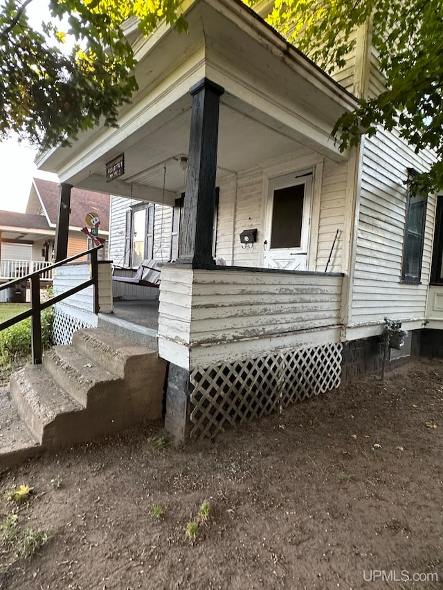 exterior space featuring covered porch