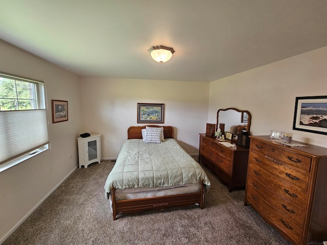 bedroom with dark carpet