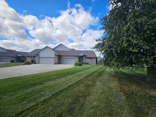 view of front facade featuring a garage and a front yard