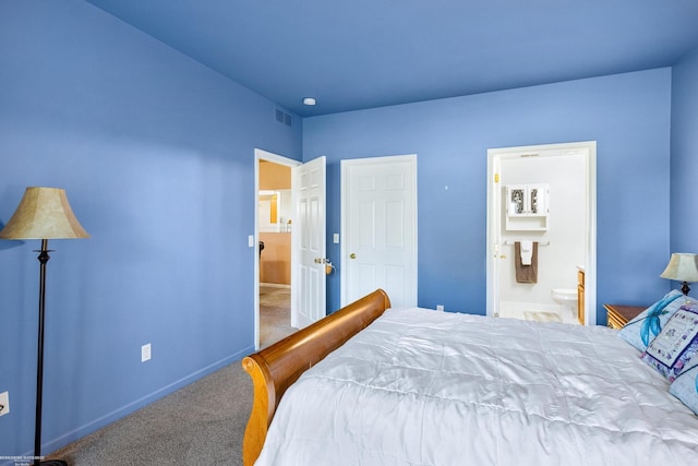 carpeted bedroom featuring connected bathroom