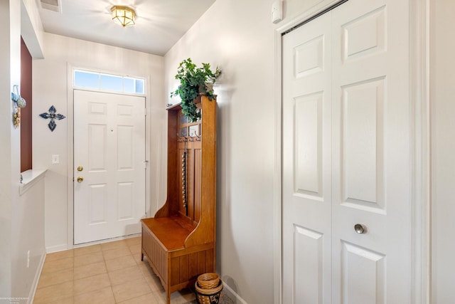 view of tiled foyer entrance