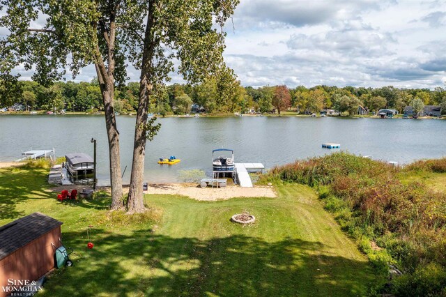 2771 Hemlock Rd, Quincy, MI 49082 - water view with a floating dock