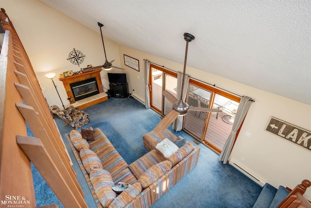 living room featuring a baseboard heating unit, a textured ceiling, ceiling fan, and carpet floors