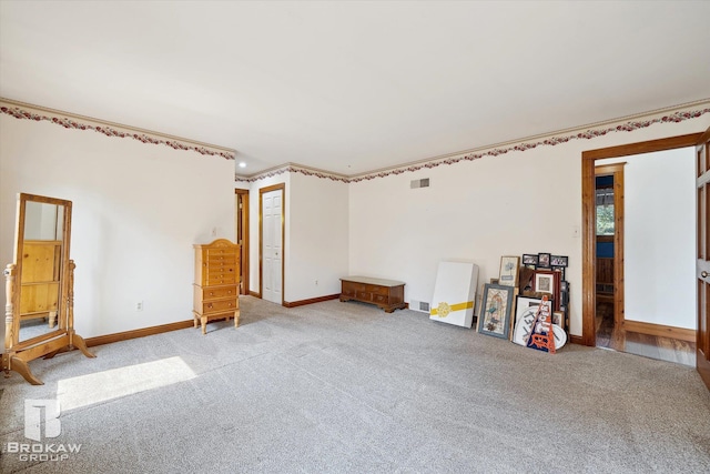 miscellaneous room featuring light colored carpet and crown molding