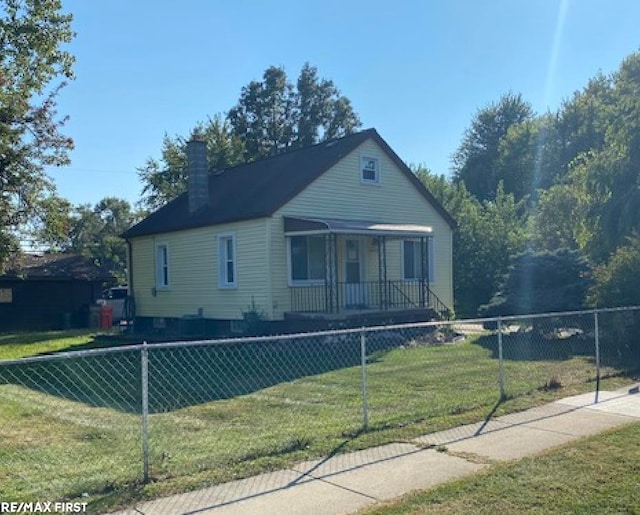 bungalow with a front yard