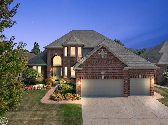 view of front of property with a lawn