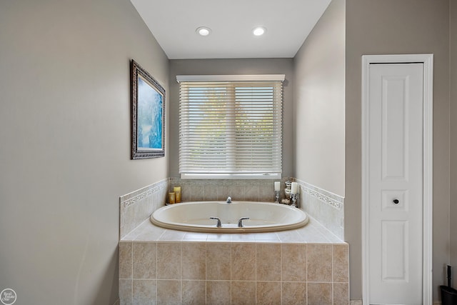 bathroom with tiled tub