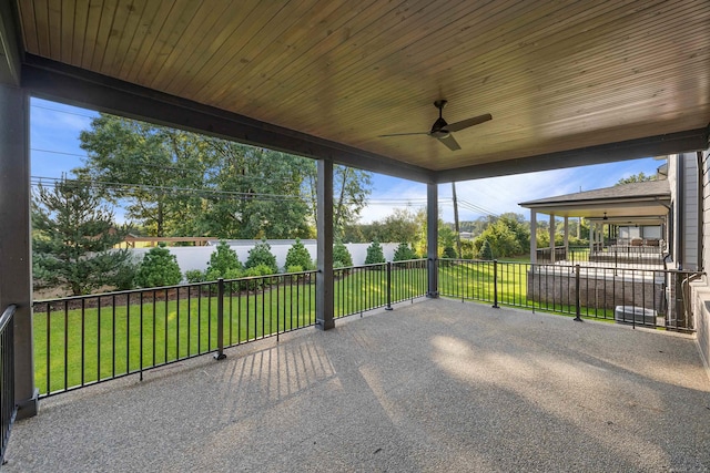 exterior space with ceiling fan