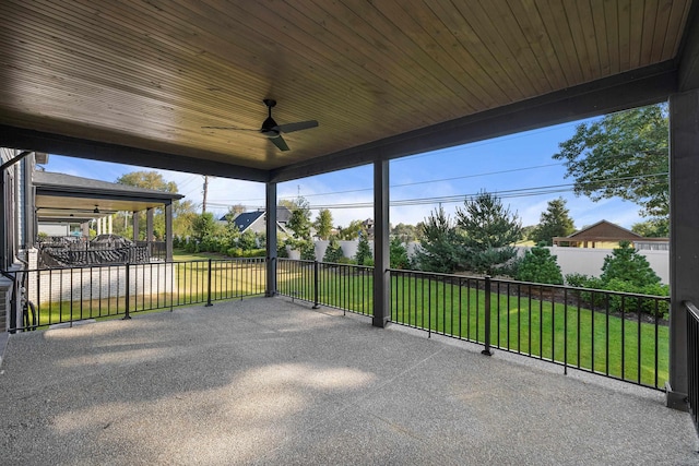 view of patio featuring ceiling fan