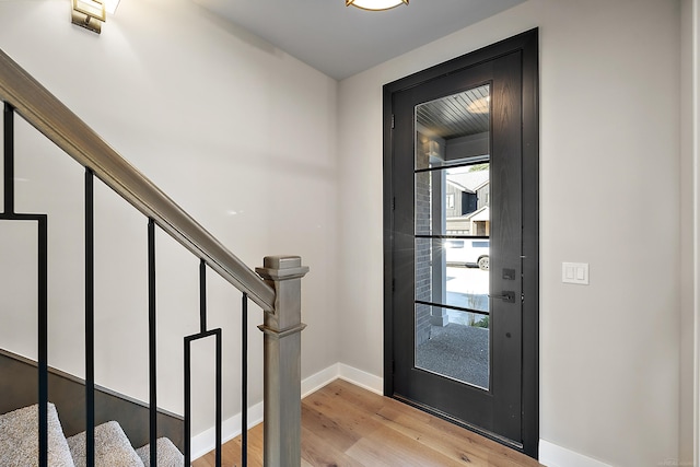 entryway featuring light hardwood / wood-style floors and a wealth of natural light