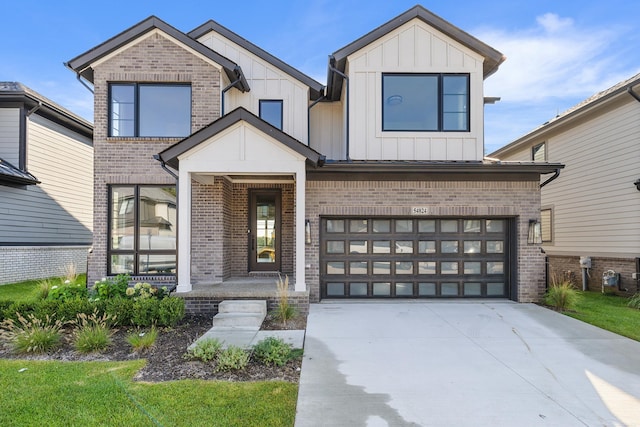 view of front of property featuring a garage