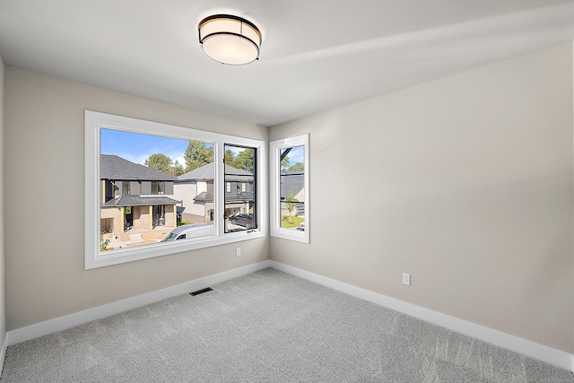 empty room with carpet floors