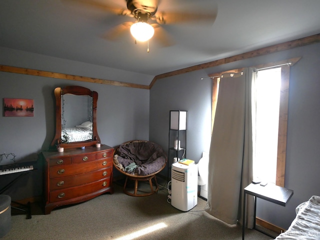 bedroom featuring ceiling fan and carpet flooring