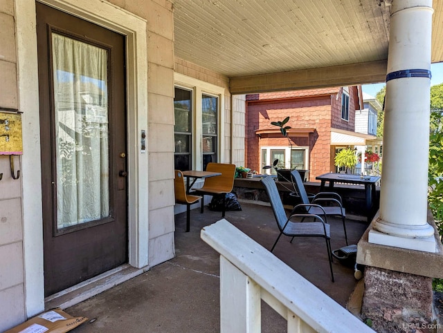 view of patio featuring a porch