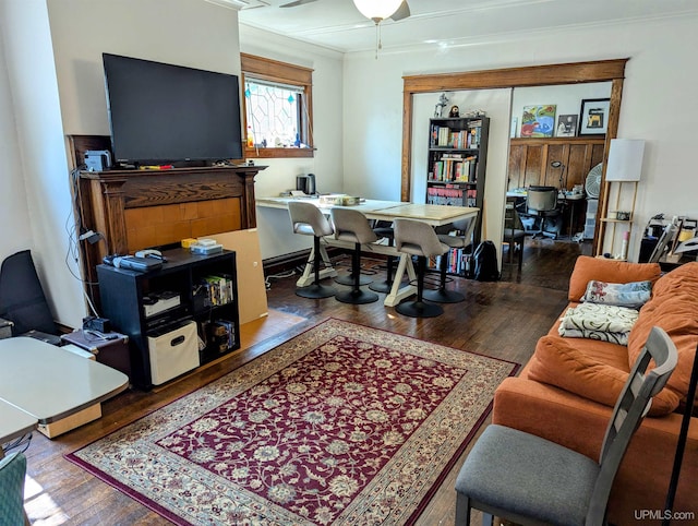 office space with ornamental molding, ceiling fan, and hardwood / wood-style flooring