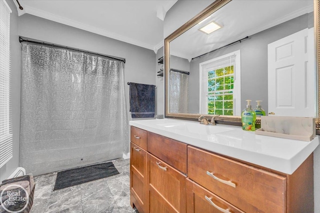 bathroom featuring walk in shower, crown molding, and vanity