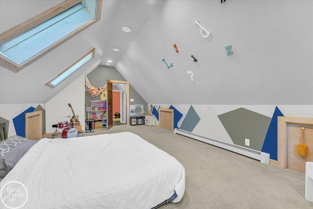 bedroom featuring carpet, lofted ceiling with skylight, and a baseboard heating unit