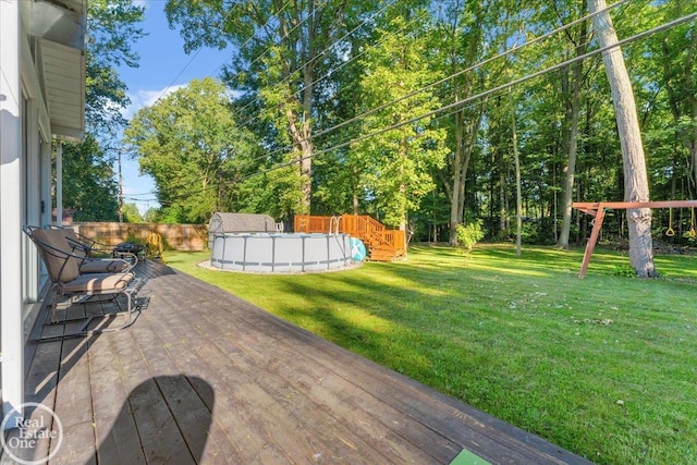 view of yard featuring a swimming pool side deck