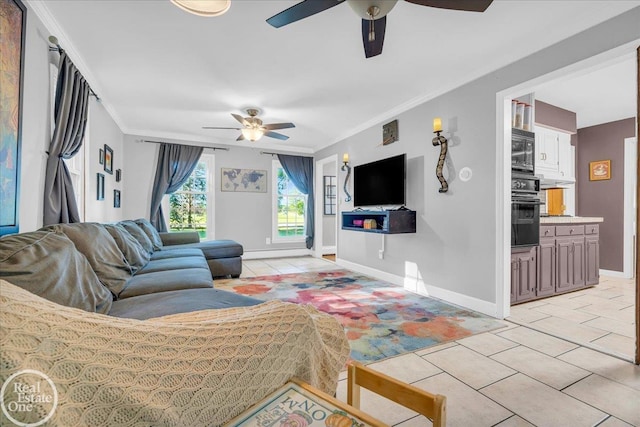 living room featuring light tile patterned floors, ornamental molding, and ceiling fan