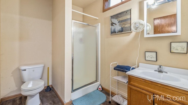 bathroom with walk in shower, vanity, toilet, and hardwood / wood-style flooring