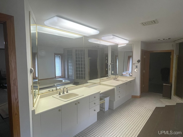 bathroom with vanity and tile patterned floors