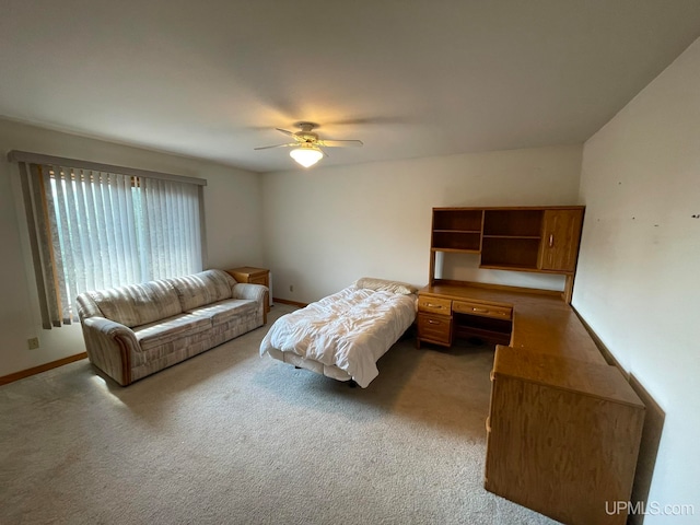 bedroom featuring ceiling fan and carpet flooring