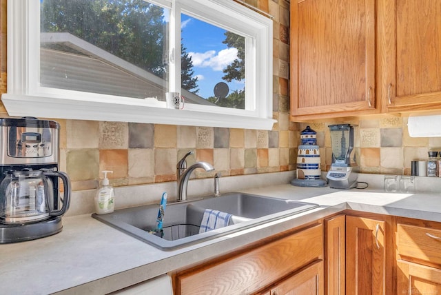 kitchen with backsplash and sink