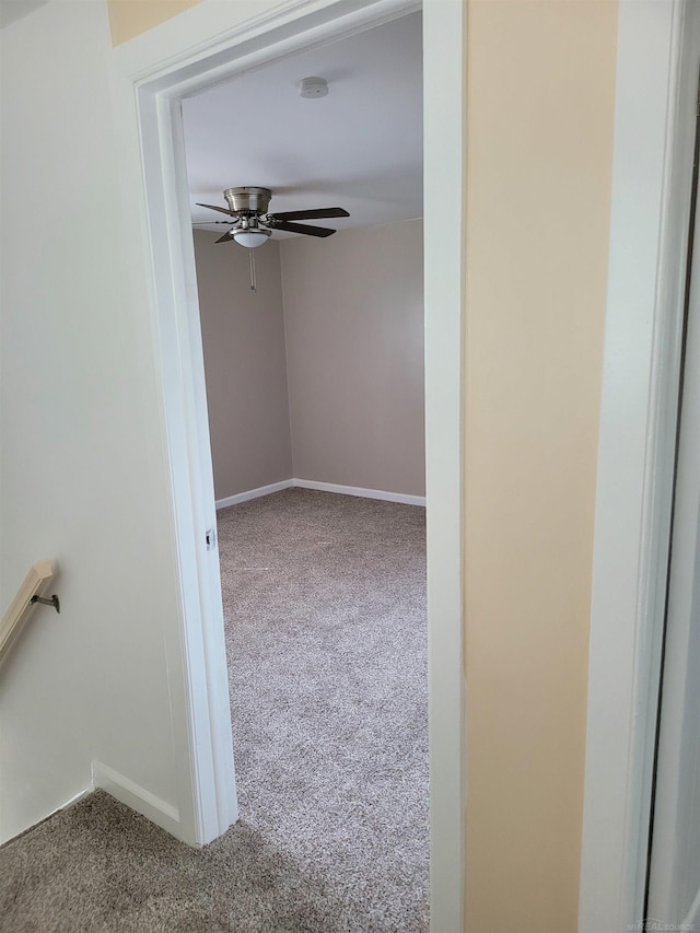 interior space featuring ceiling fan