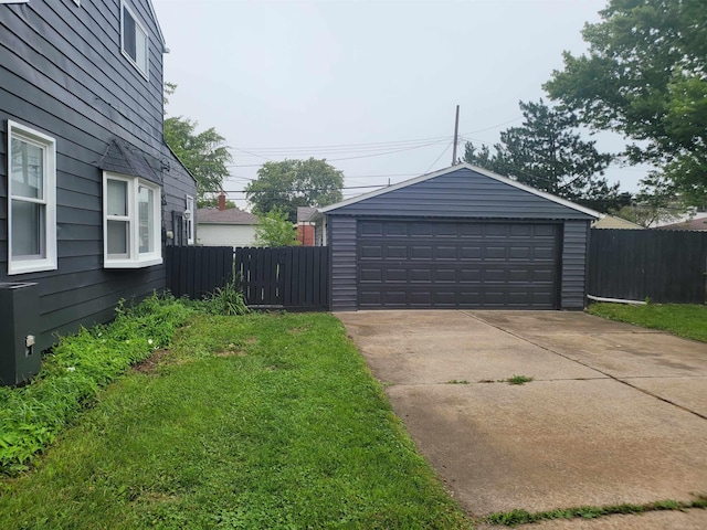 garage featuring a yard