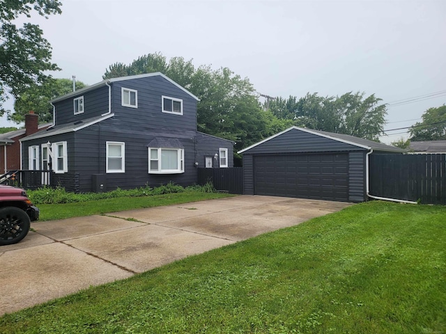 view of property exterior with a lawn, an outdoor structure, and a garage