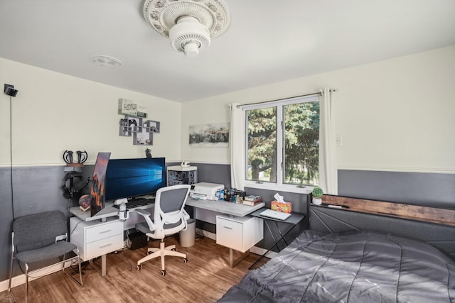 bedroom featuring hardwood / wood-style floors