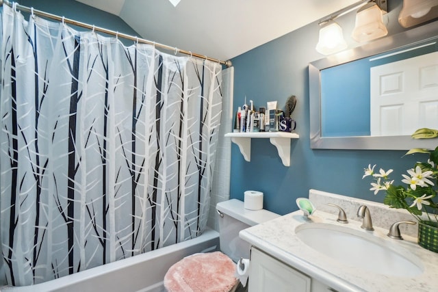 full bathroom with toilet, vanity, vaulted ceiling, and shower / bath combo with shower curtain