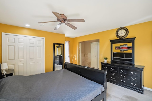 bedroom with light carpet and ceiling fan