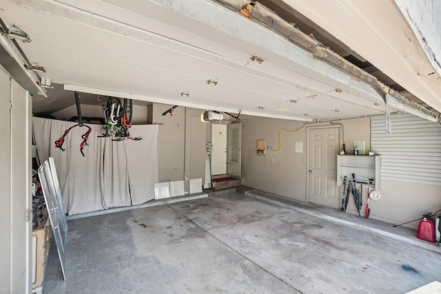 garage featuring a garage door opener