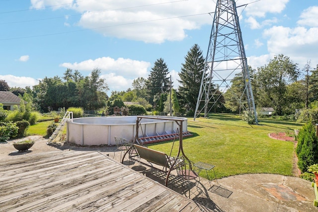 wooden deck with a yard