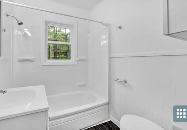 full bathroom with shower / washtub combination, vanity, and toilet