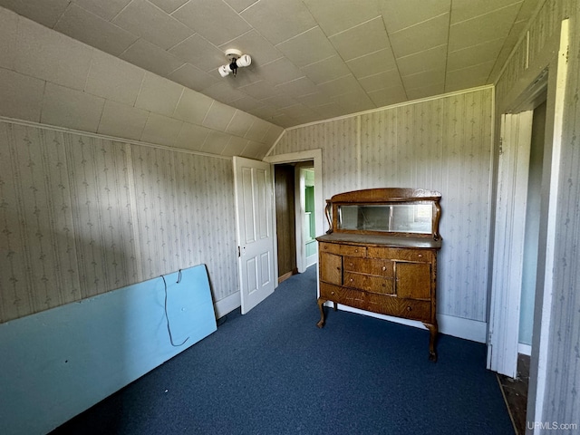 52 Senter St, Ahmeek, MI 49901 - carpeted bedroom with wallpapered walls and lofted ceiling