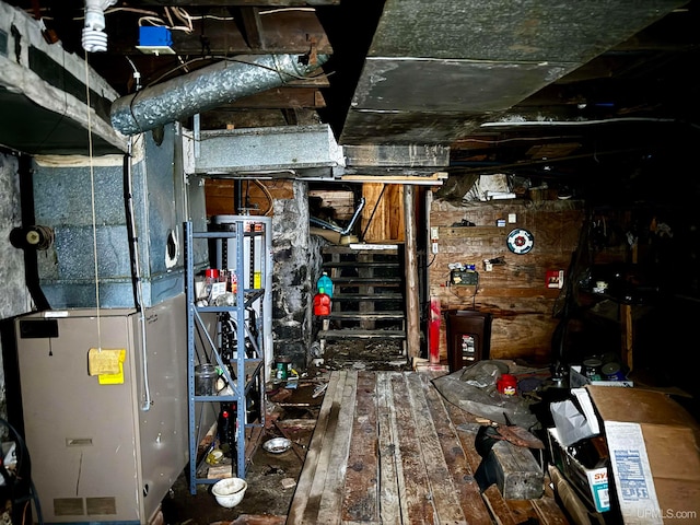 basement with hardwood / wood-style flooring