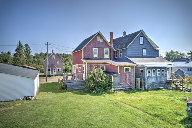 52 Senter St, Ahmeek, MI 49901 - back of property with a yard and a chimney