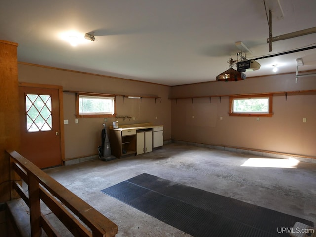 garage featuring a garage door opener