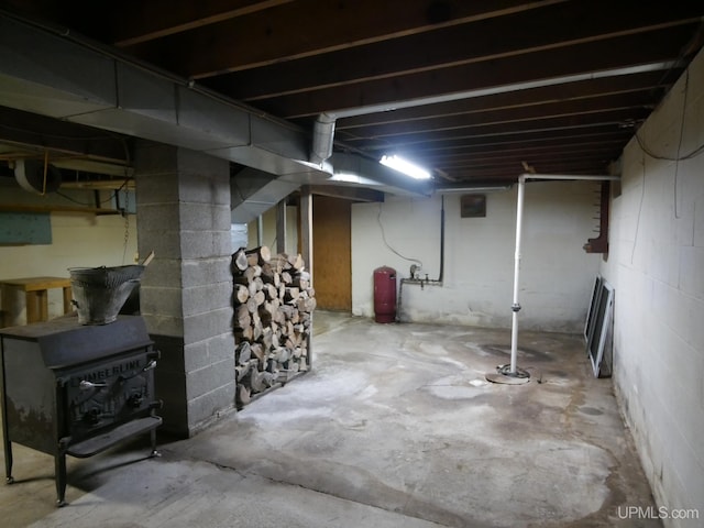 basement with a wood stove