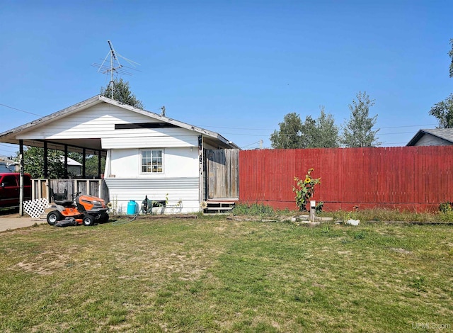 view of yard with a carport