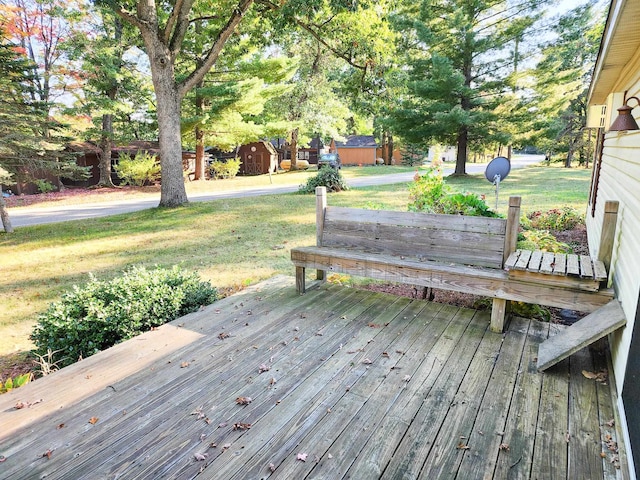 wooden deck with a yard